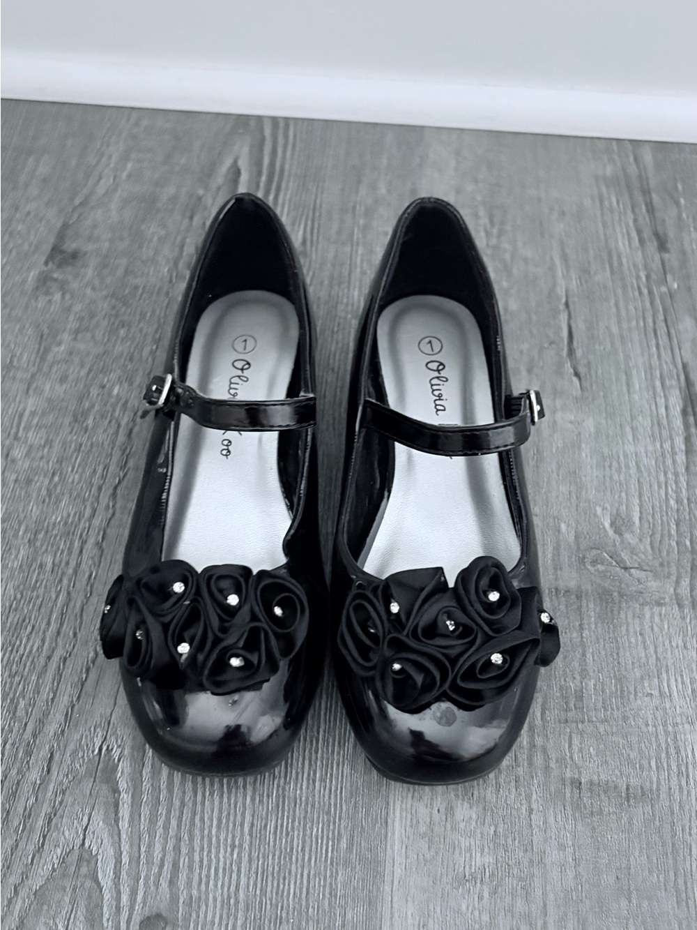 Girls' Black Patent Mary Janes with Floral Appliqué. Size 1